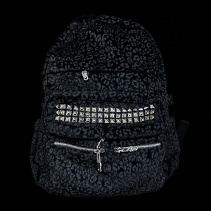 Leopard-print bagpack with stones